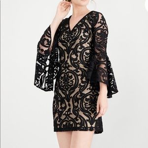 Black/nude lace cocktail dress with bell sleeves